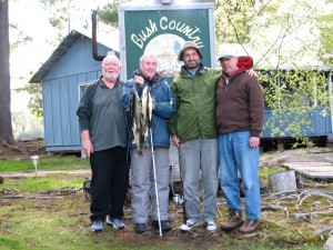 Photo of Jay, Bill, Miles and Lawrence with stringer