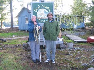 Photo of Lawrence and Miles with a stringer of Walleye