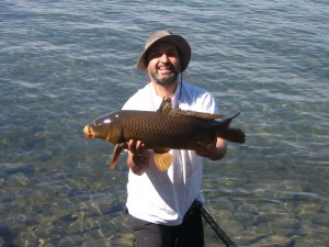 Photo of Lawrence holding the first Carp Photo of Lawrence holding the first Carp