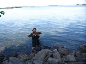 Photo of two more Carp – one of which shows the rough terrain leading down to the water Photo of two more Carp – one of which shows the rough terrain leading down to the water
