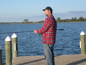 Photo of Lawrence fishing on the peer