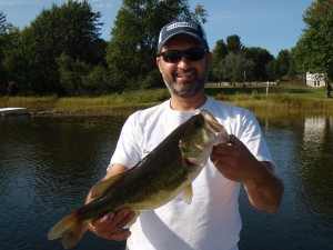 Photo of Lawrence holding 4lb Large Mouth caught using his Shimano Curado / Cumara combo